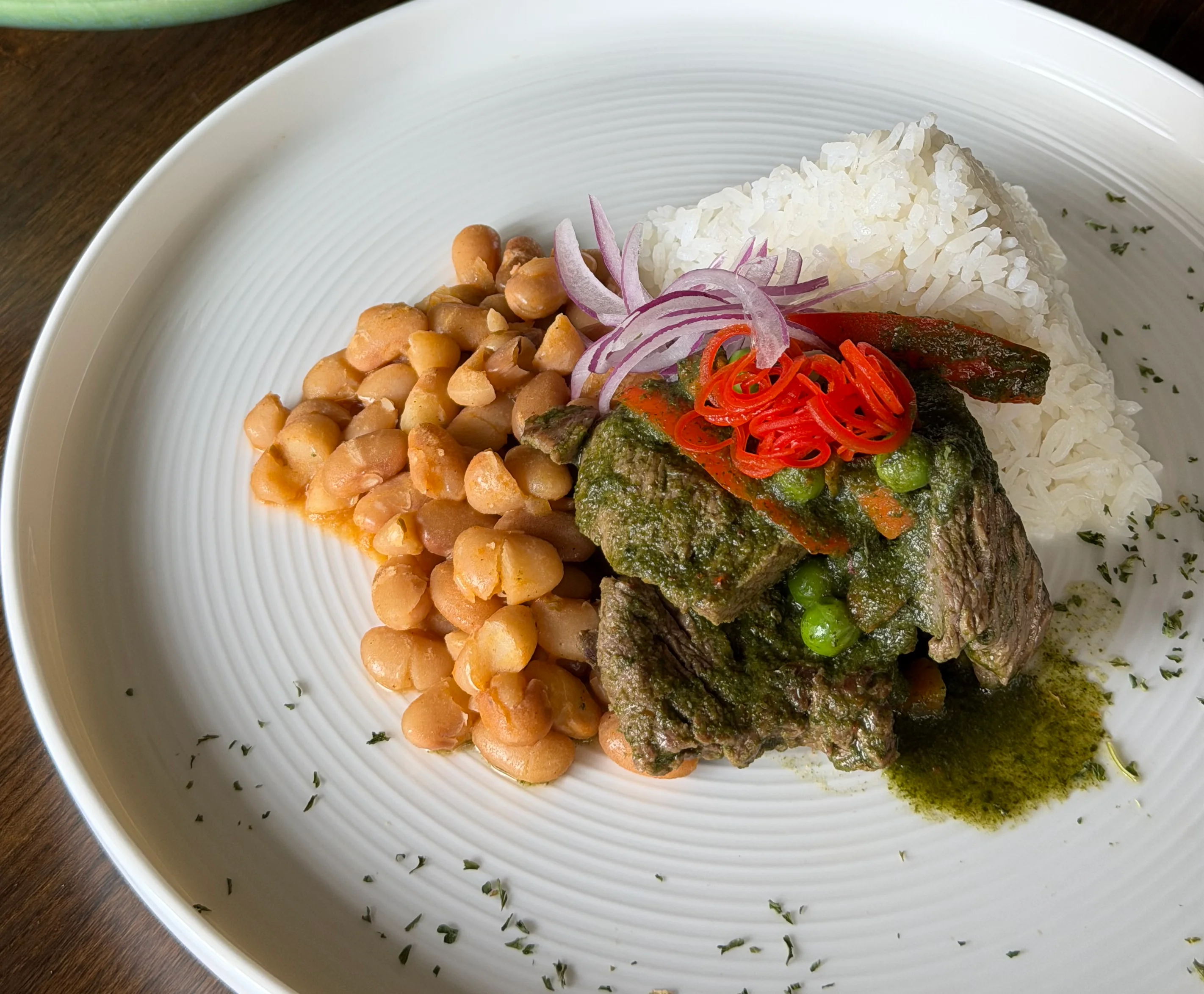 Peruvian seco de carne with rice and beans