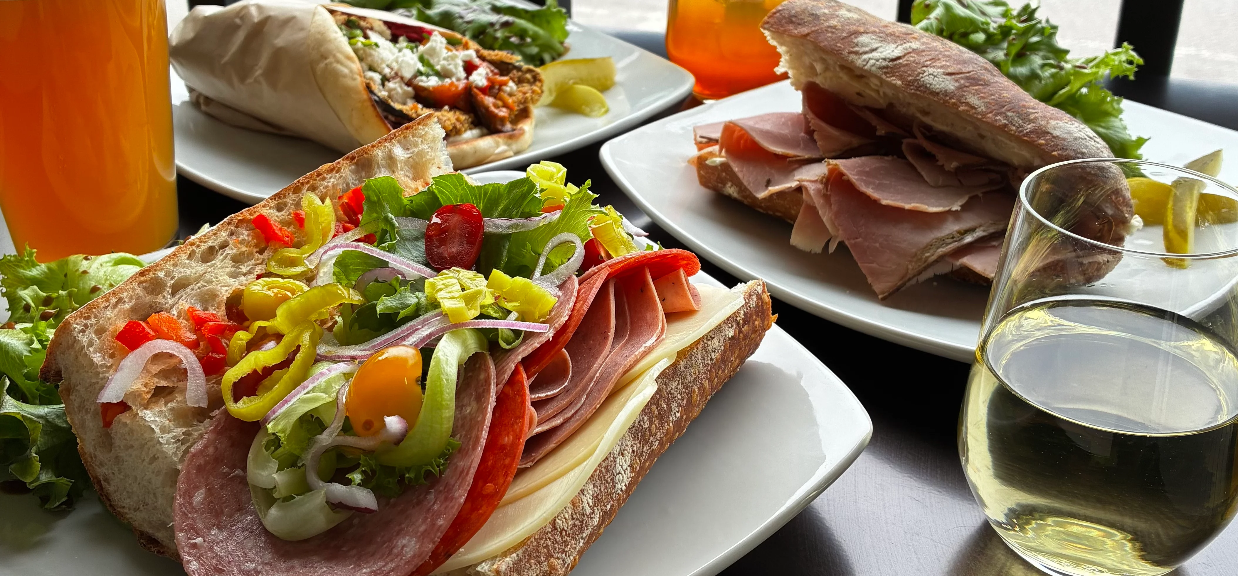 Italian sub sandwich with assorted meats and fresh vegetables