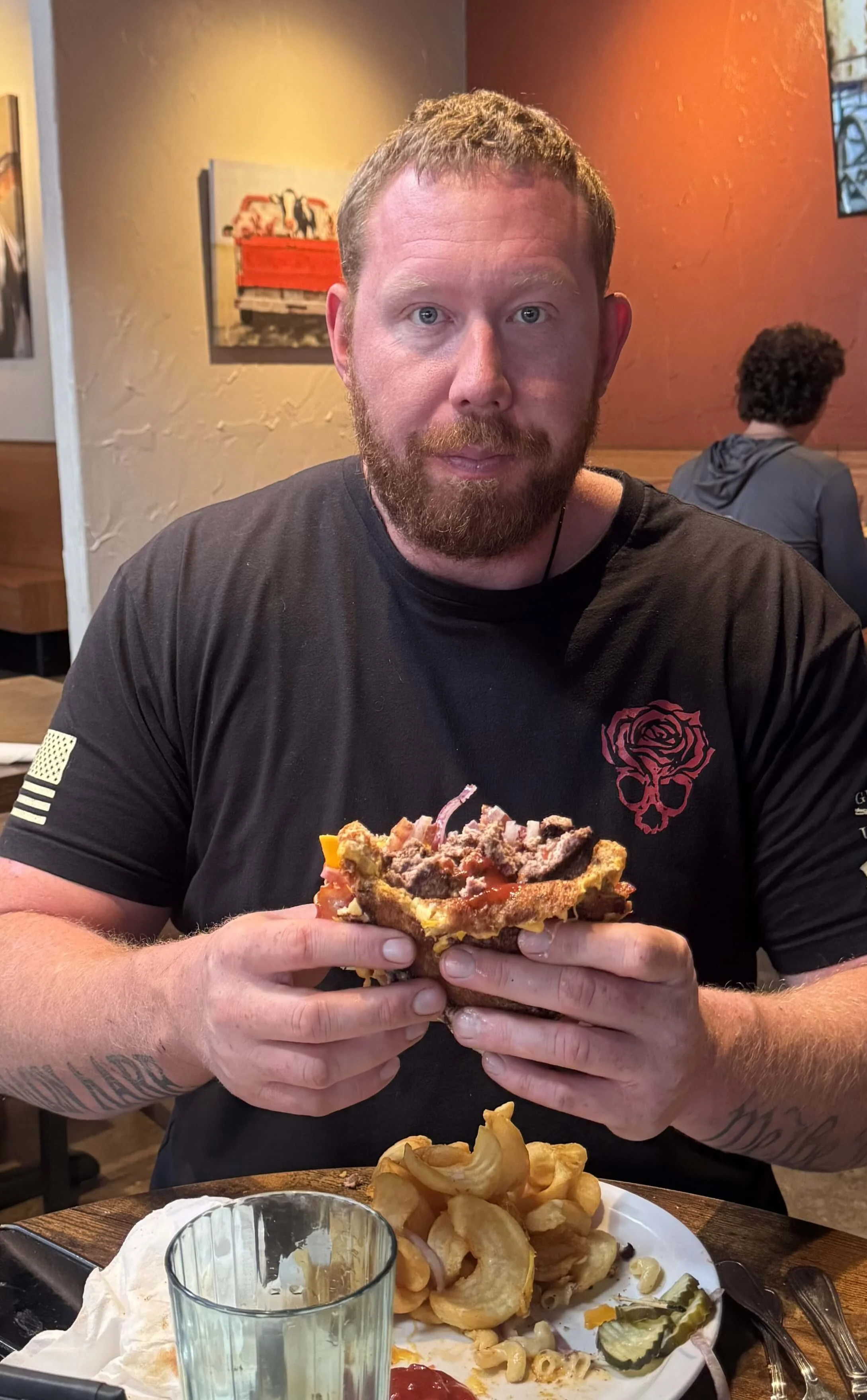Juicy cheeseburger with toppings in a casual dining setting