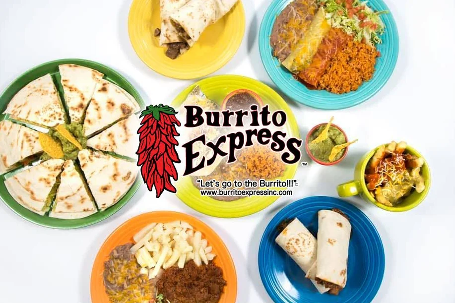 Colorful Mexican platter with burritos, quesadillas, and rice