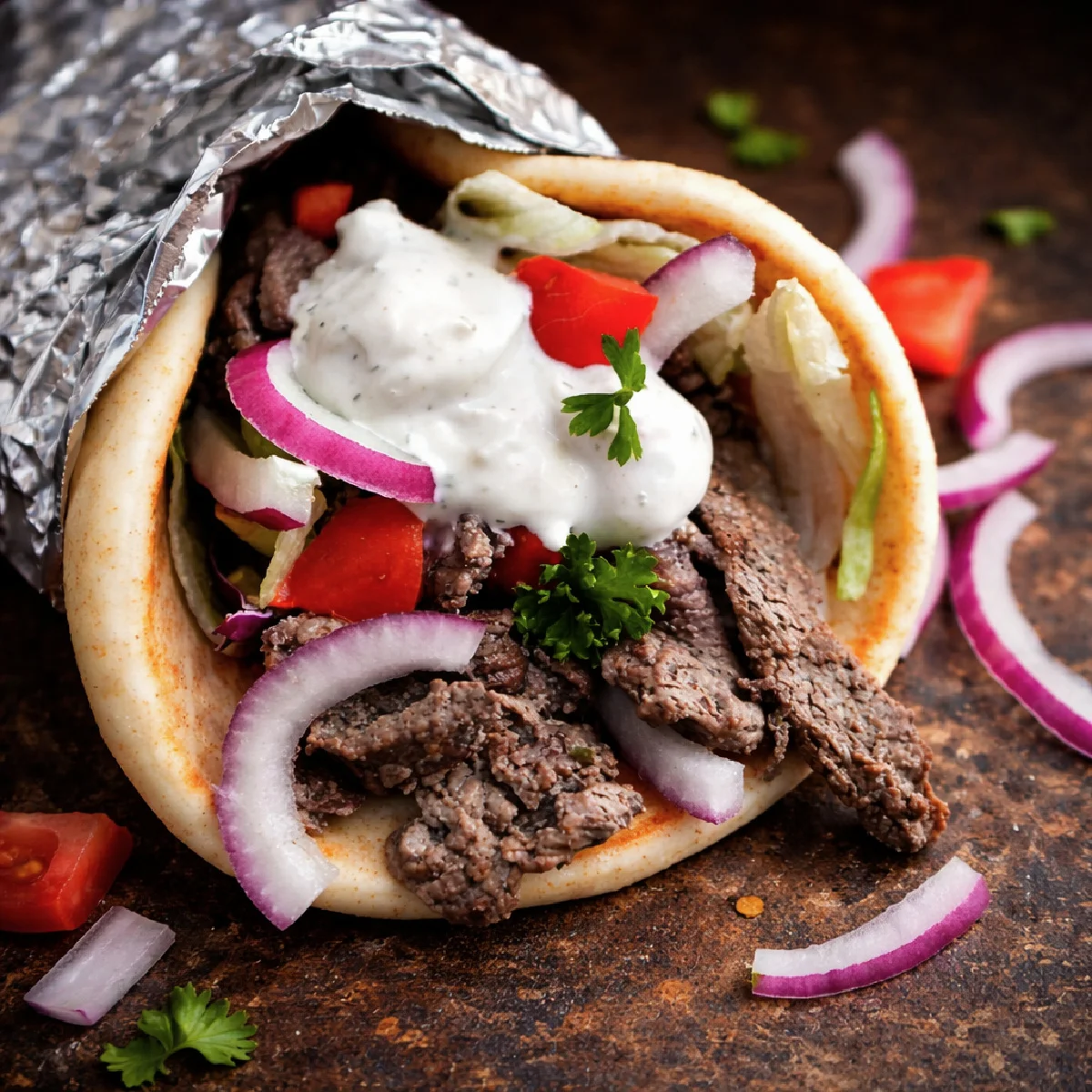 Delicious gyro wrap with beef and fresh toppings
