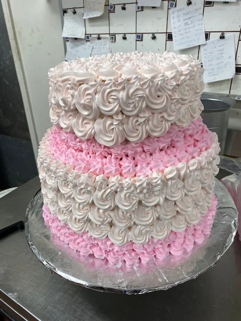 Pink and white rosette celebration cake from The Kosher Pastry Oven