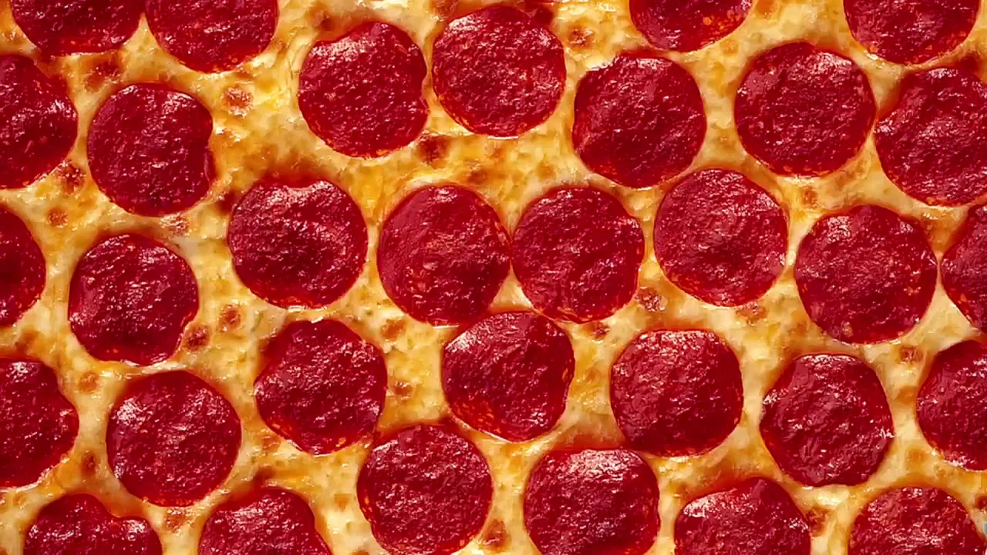 Classic pepperoni pizza with a golden crust and melted cheese