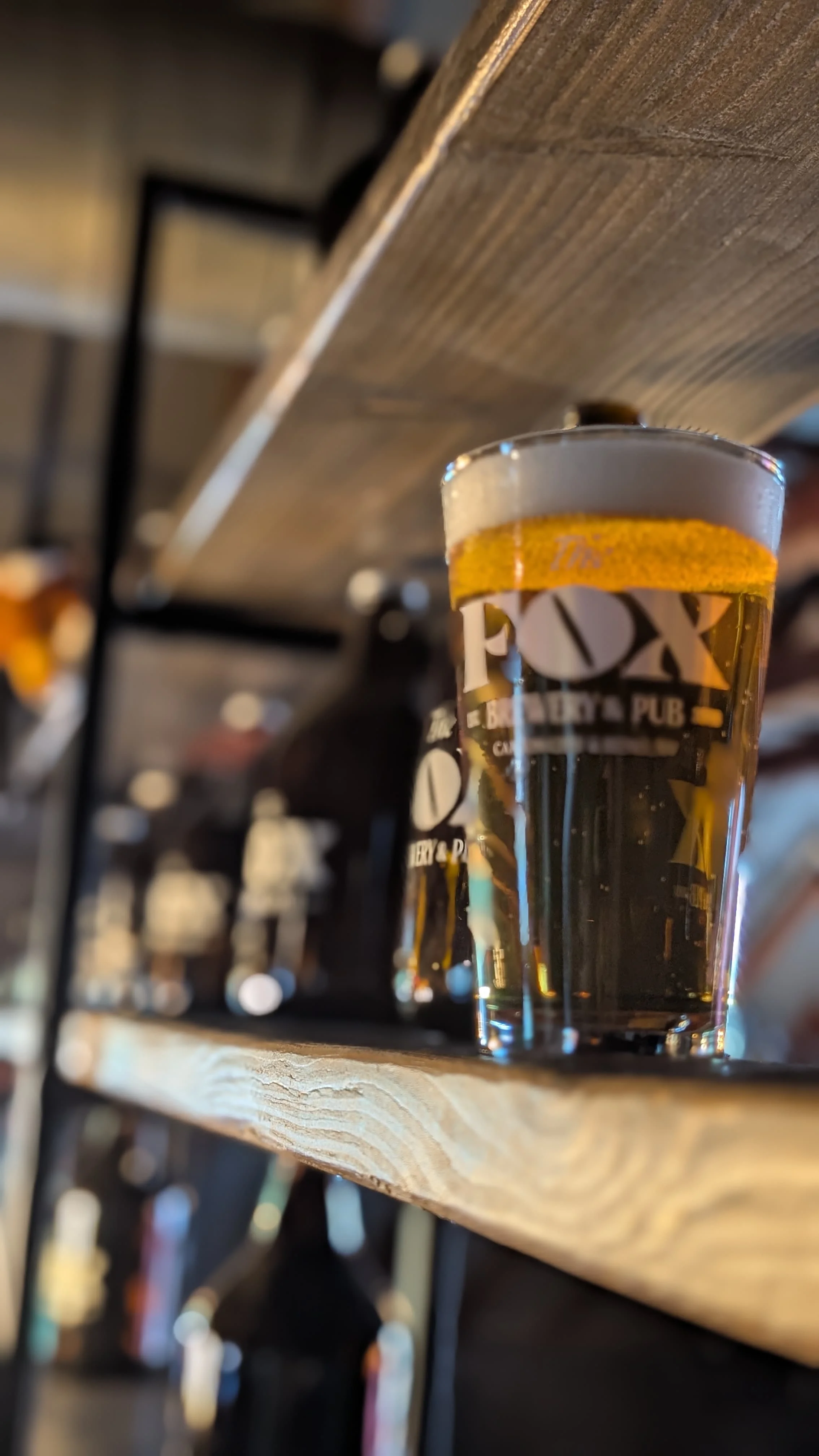 Craft beer served in a glass at a brewery pub