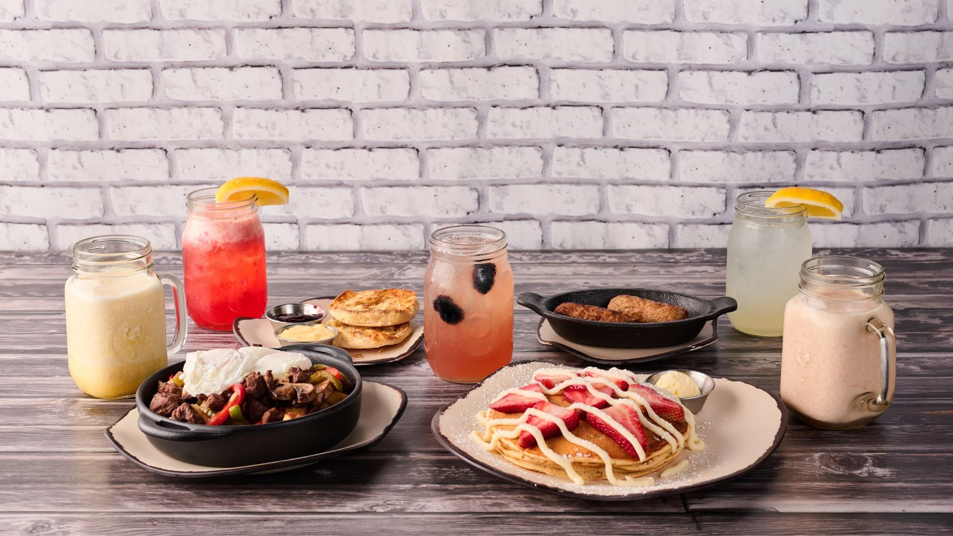 Delicious American breakfast with pancakes and steak fajitas