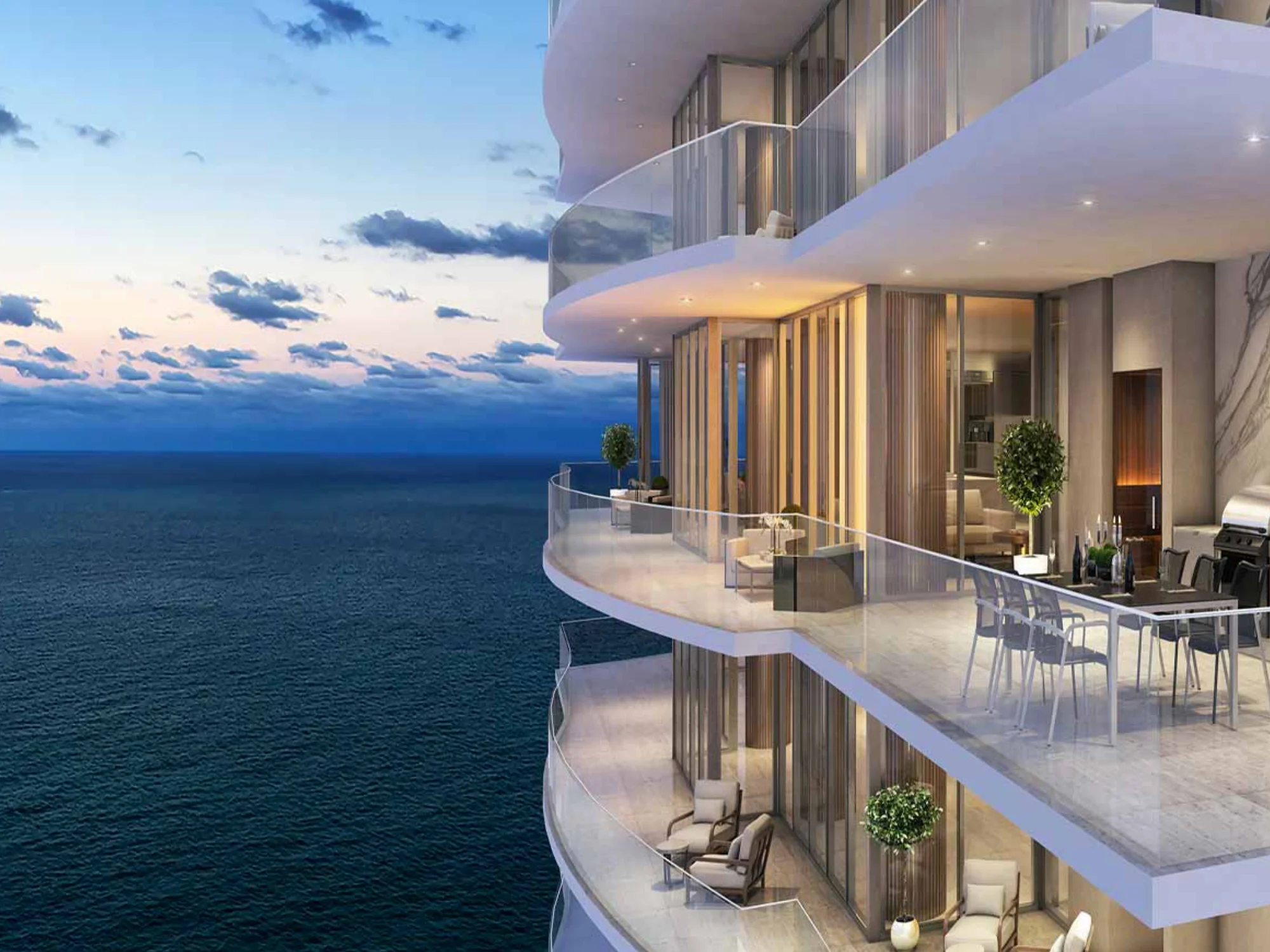 Luxury oceanfront balcony with modern furniture