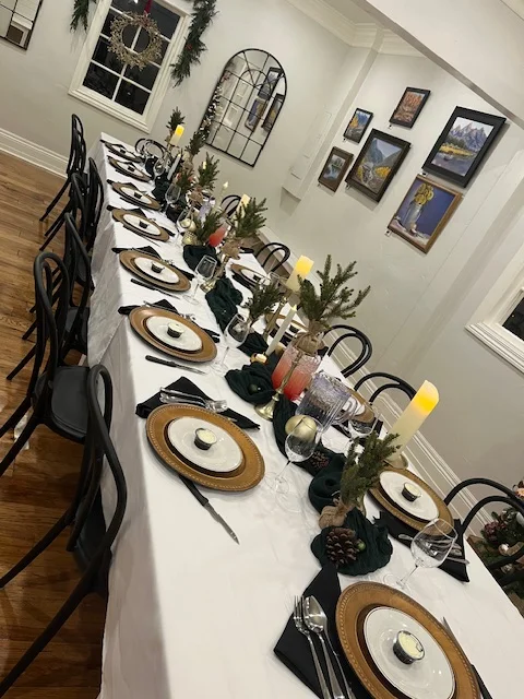 Elegant dining setup with festive decor and table settings