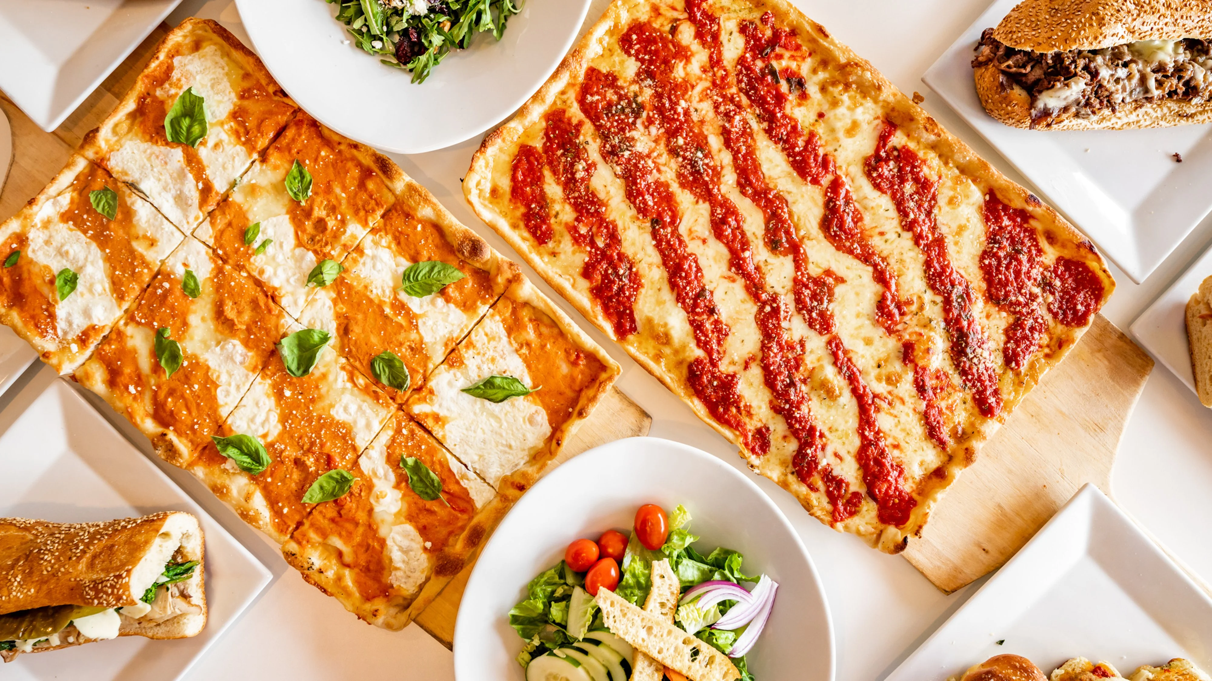 Italian pizza with marinara and creamy sauce, served with fresh salad