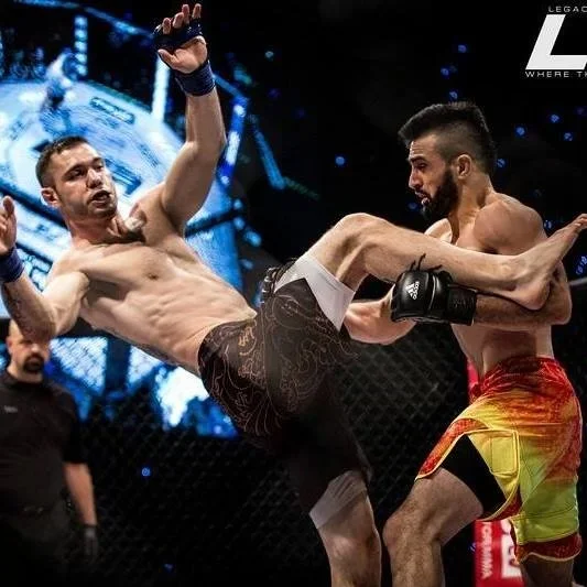 MMA fighters in action during a match