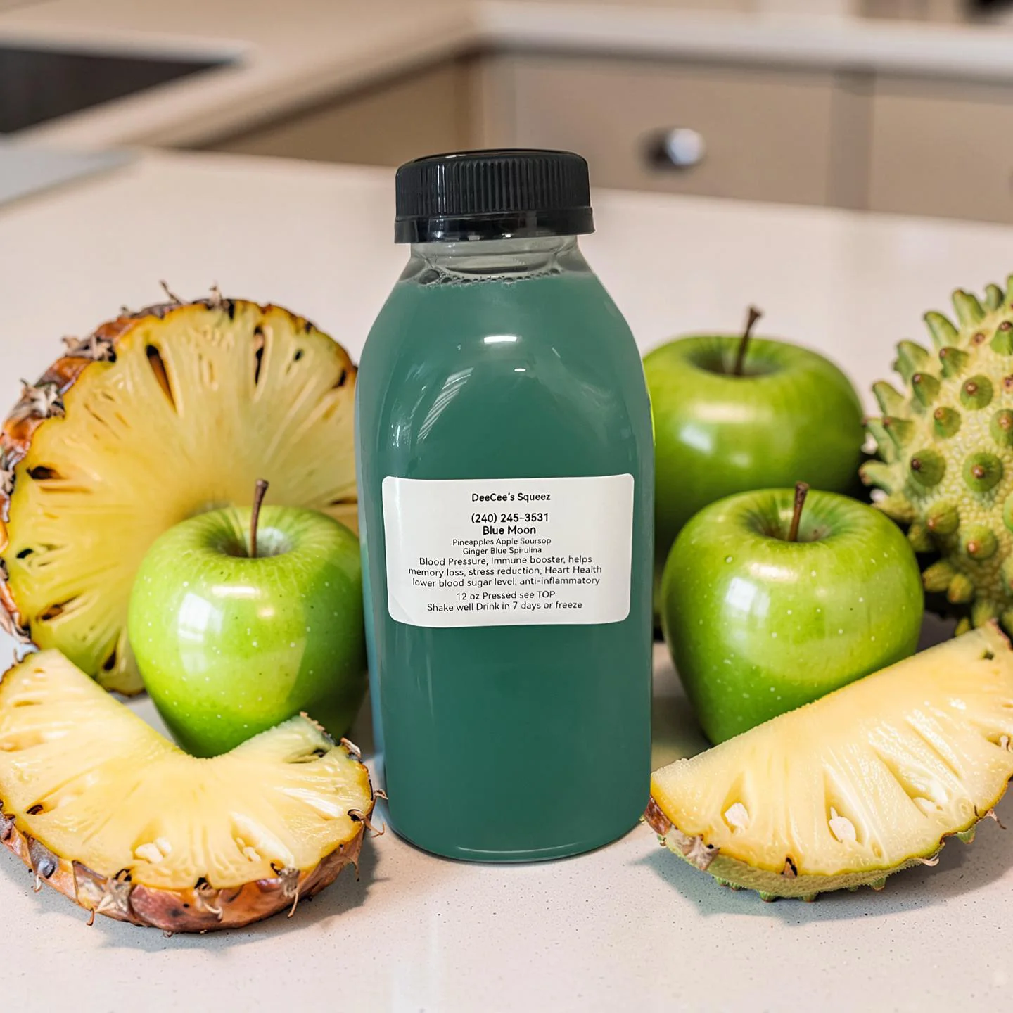 Refreshing green juice in a bottle with tropical fruits