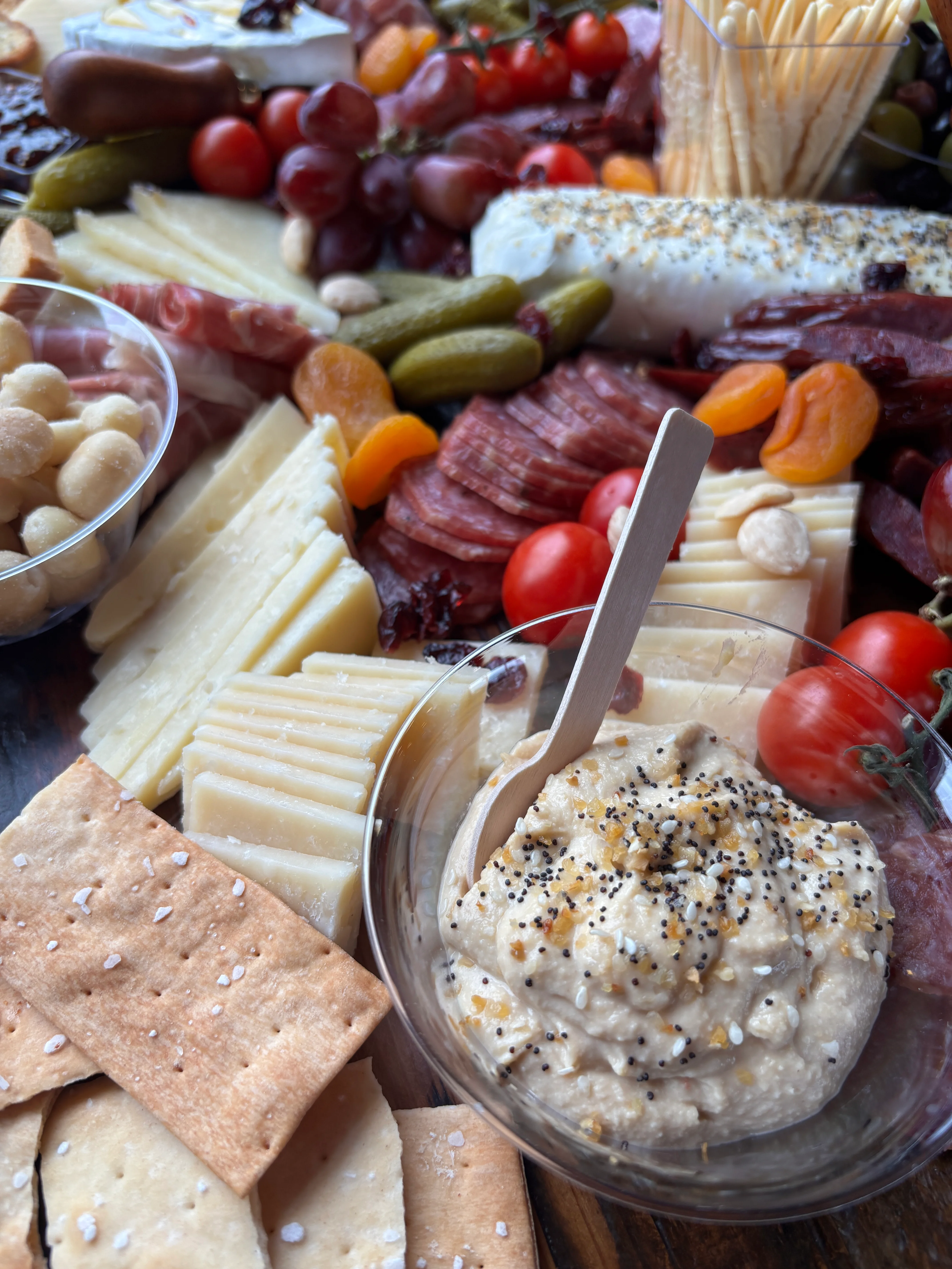 Mediterranean mezze platter with hummus and assorted cheeses