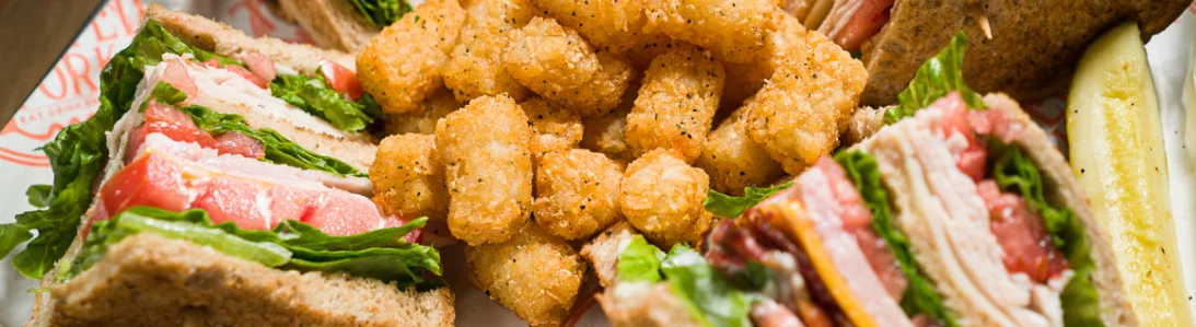 Classic club sandwich with crispy tater tots