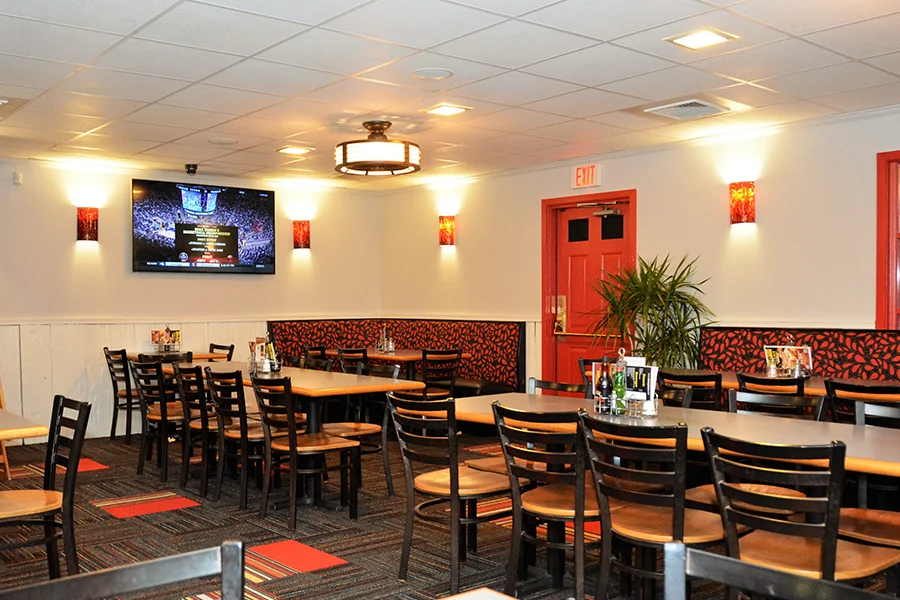 Cozy restaurant interior with modern decor and warm lighting