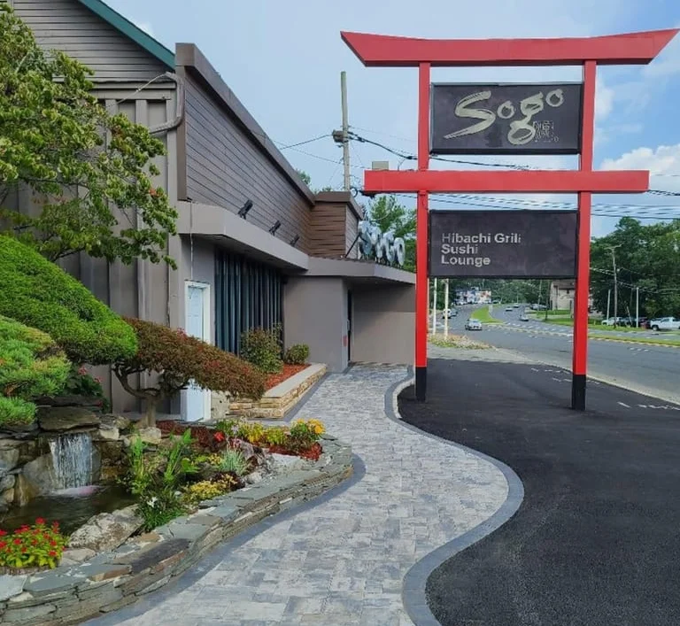 Entrance of Sogo Hibachi Grill and Sushi Lounge with landscaped pathway