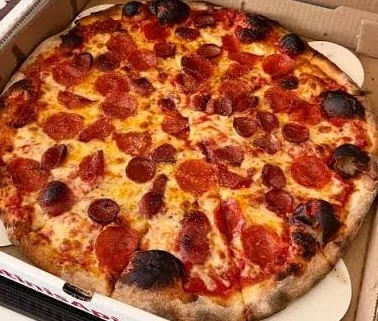 Pepperoni pizza with crispy crust and melted cheese