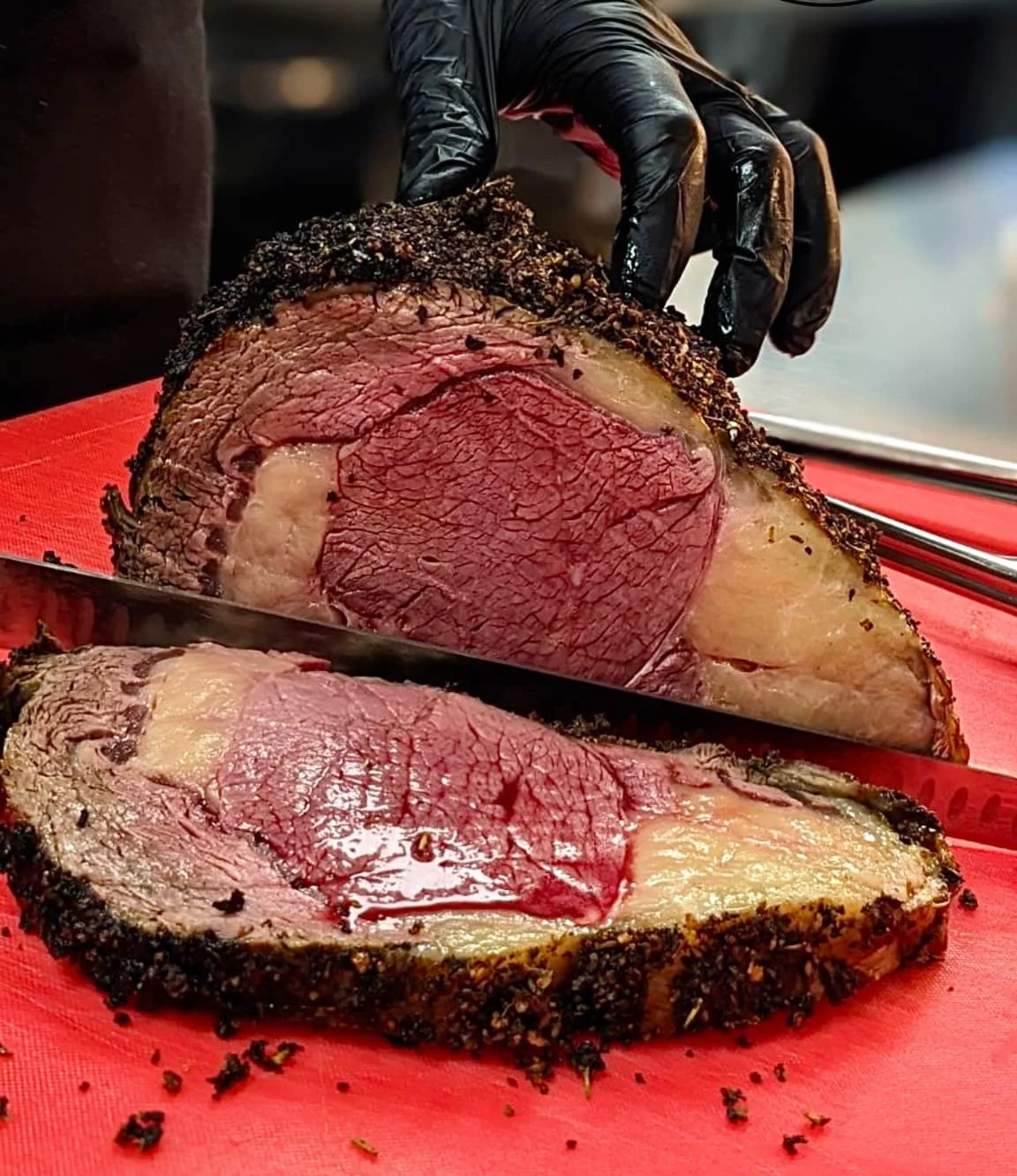 Sliced prime rib roast on a cutting board