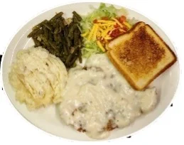 Southern chicken fried steak with gravy and sides