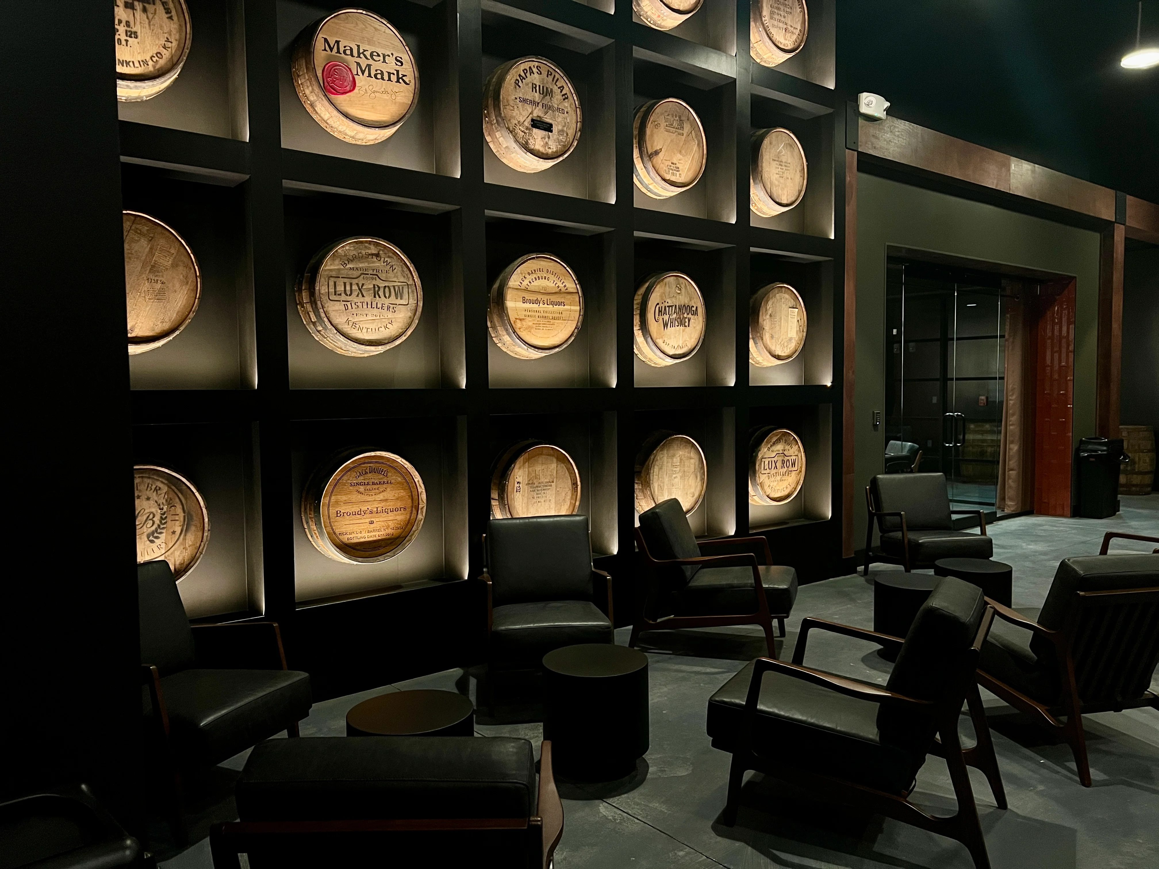 Stylish lounge area with whiskey barrel decor