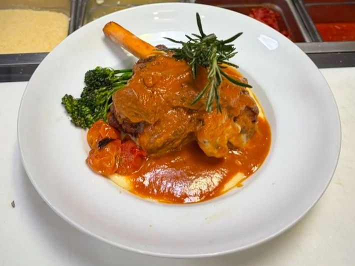 A restaurant chef preparing a dish