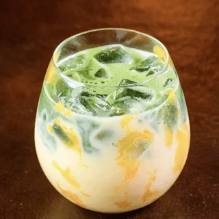 Japanese matcha latte with frothy green top
