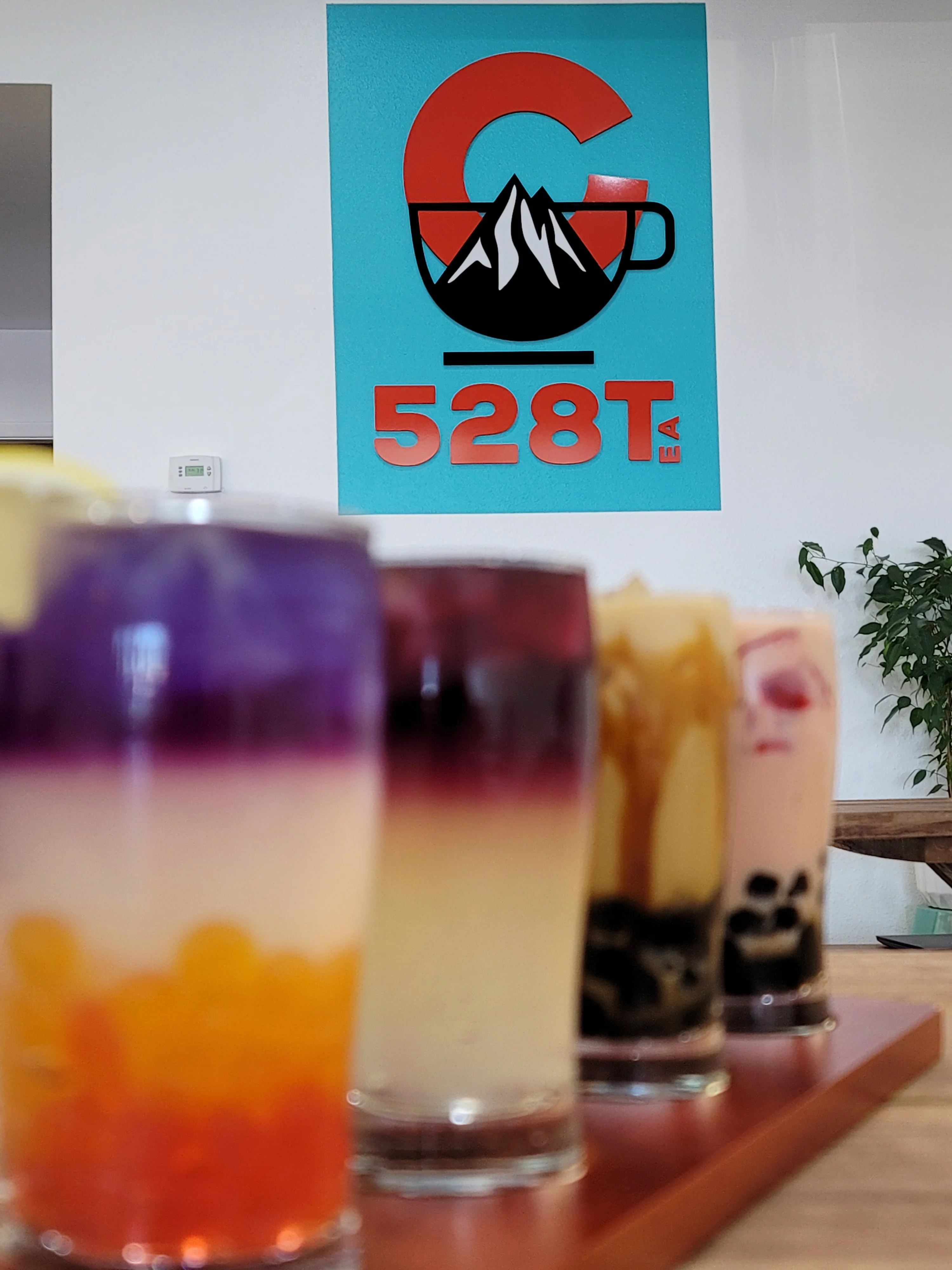 Colorful bubble tea drinks in a modern café setting