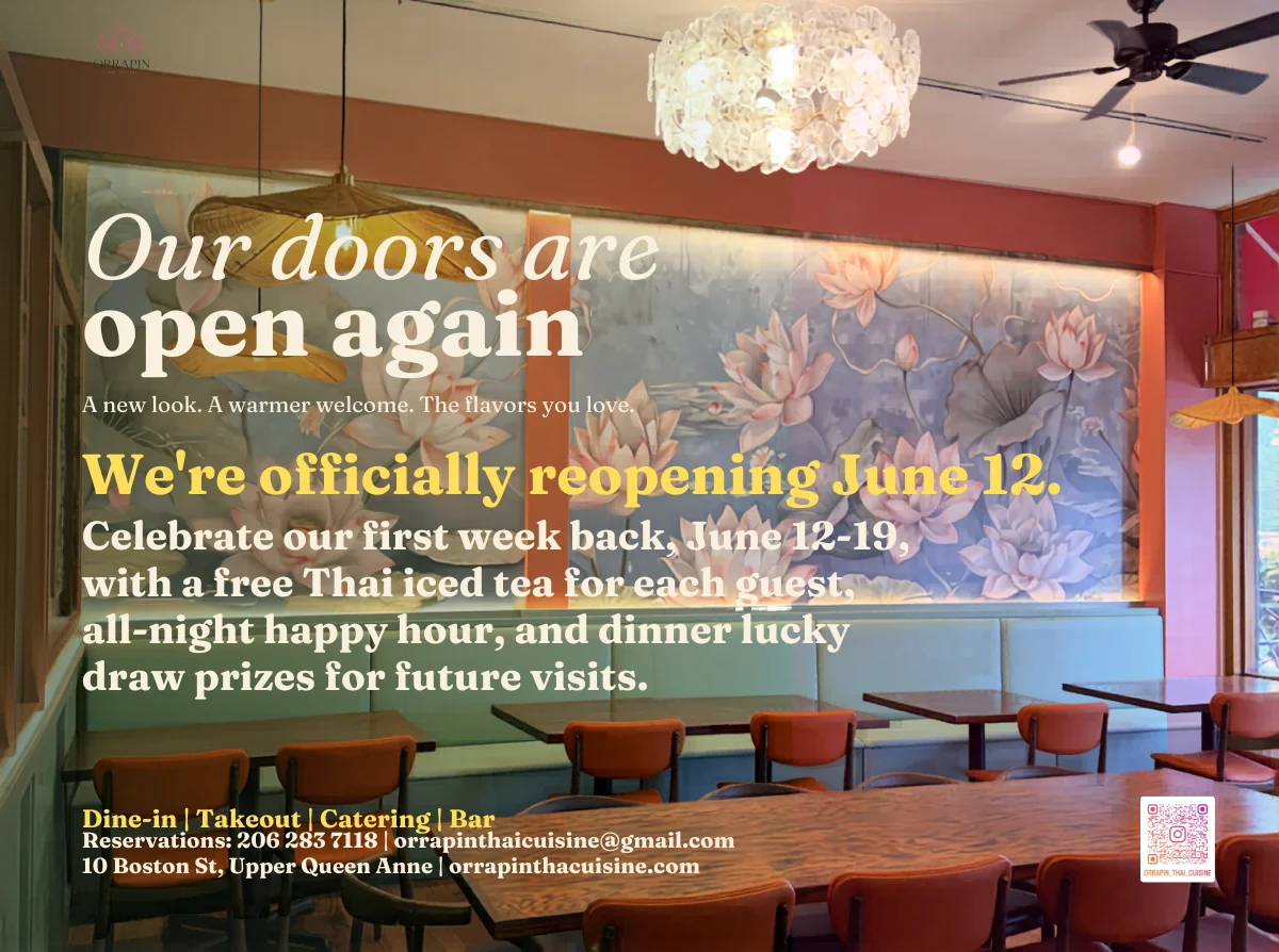 Welcoming restaurant interior with floral mural and cozy seating