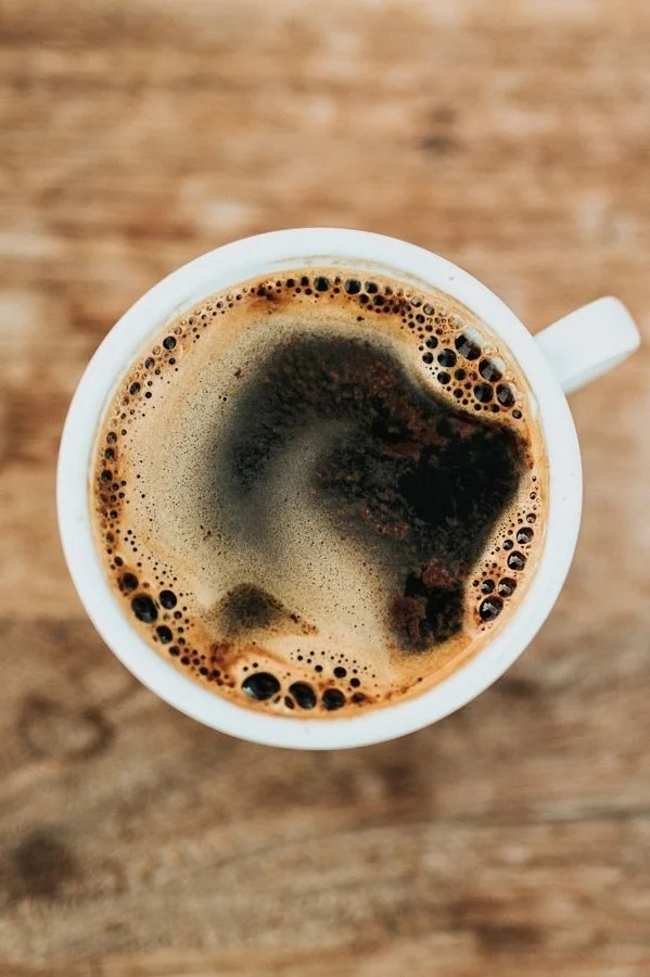 Freshly brewed coffee in a white cup