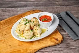 Garlic Knots   served with Marinara.