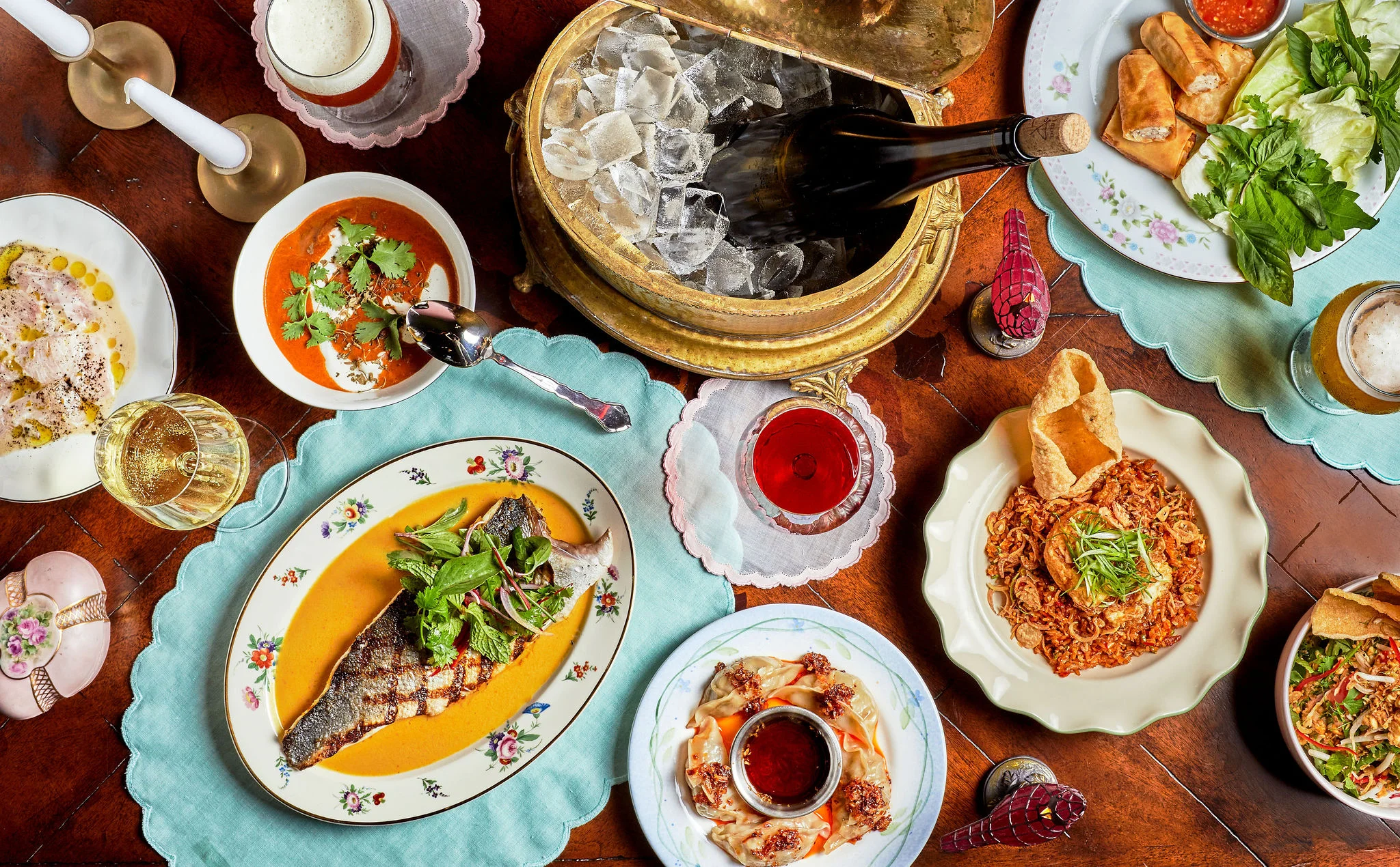 Assorted Southeast Asian dishes on a wooden table