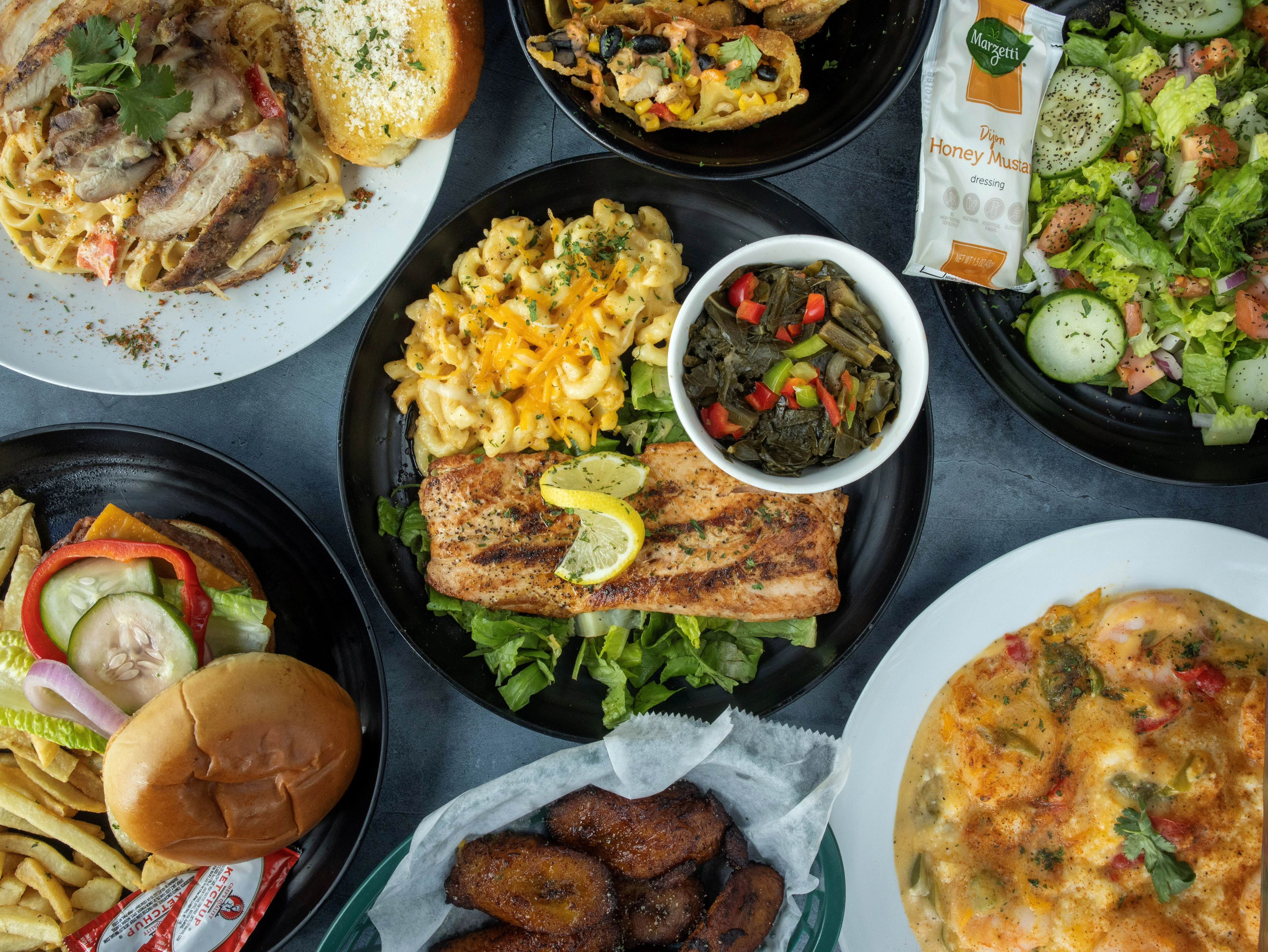 Southern-style platter with grilled salmon and mac and cheese