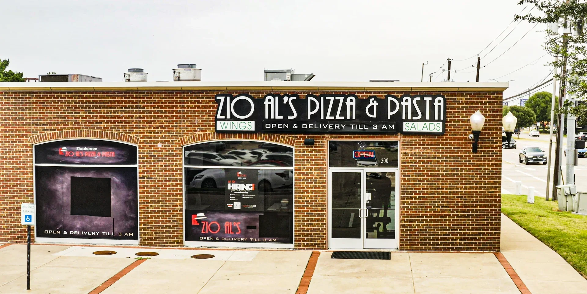 Exterior of Zio Al's Pizza & Pasta restaurant with open sign
