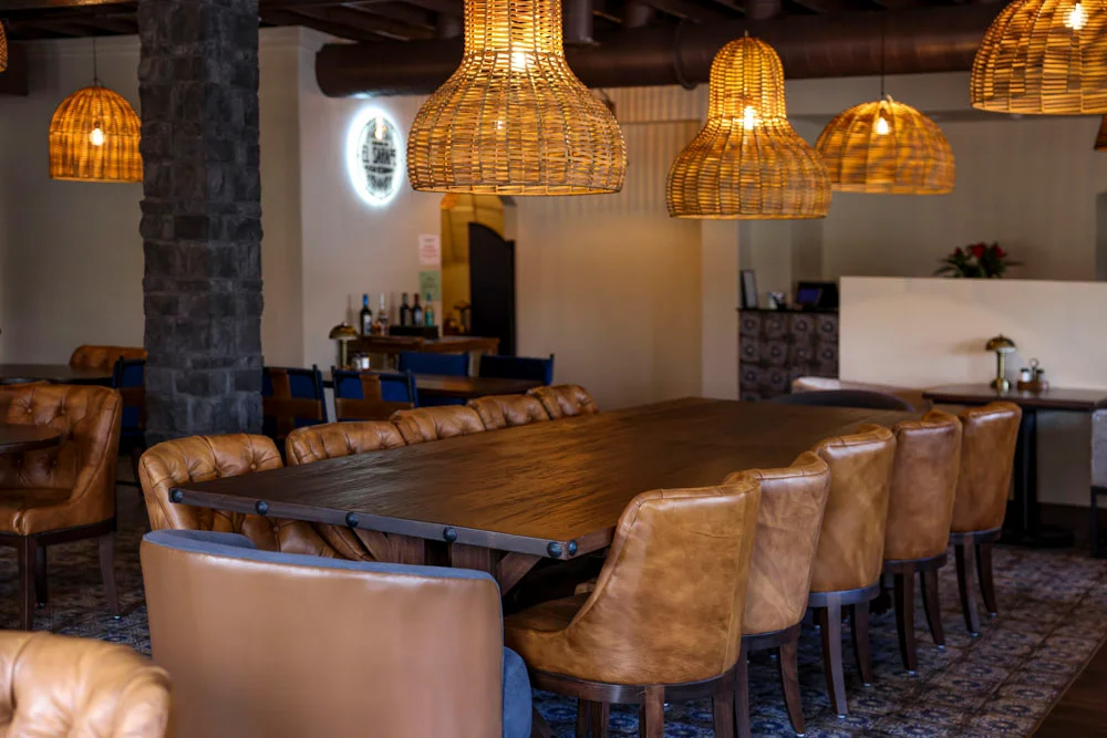Cozy restaurant interior with warm lighting and wooden furniture