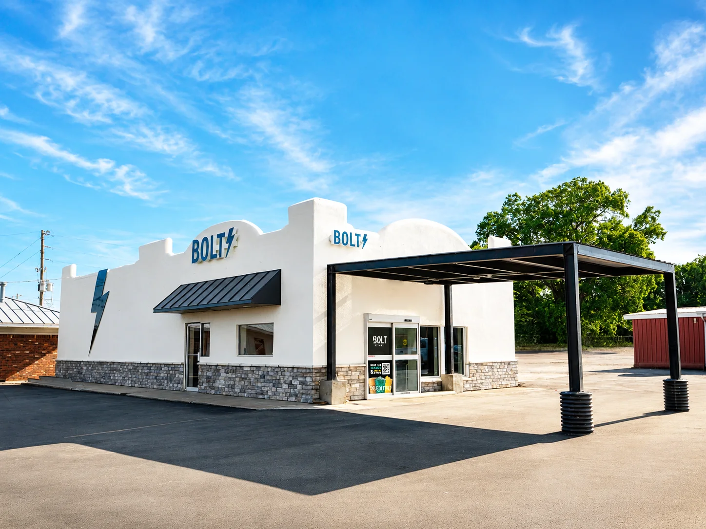 Exterior view of BOLT restaurant with modern design and clear blue sky.
