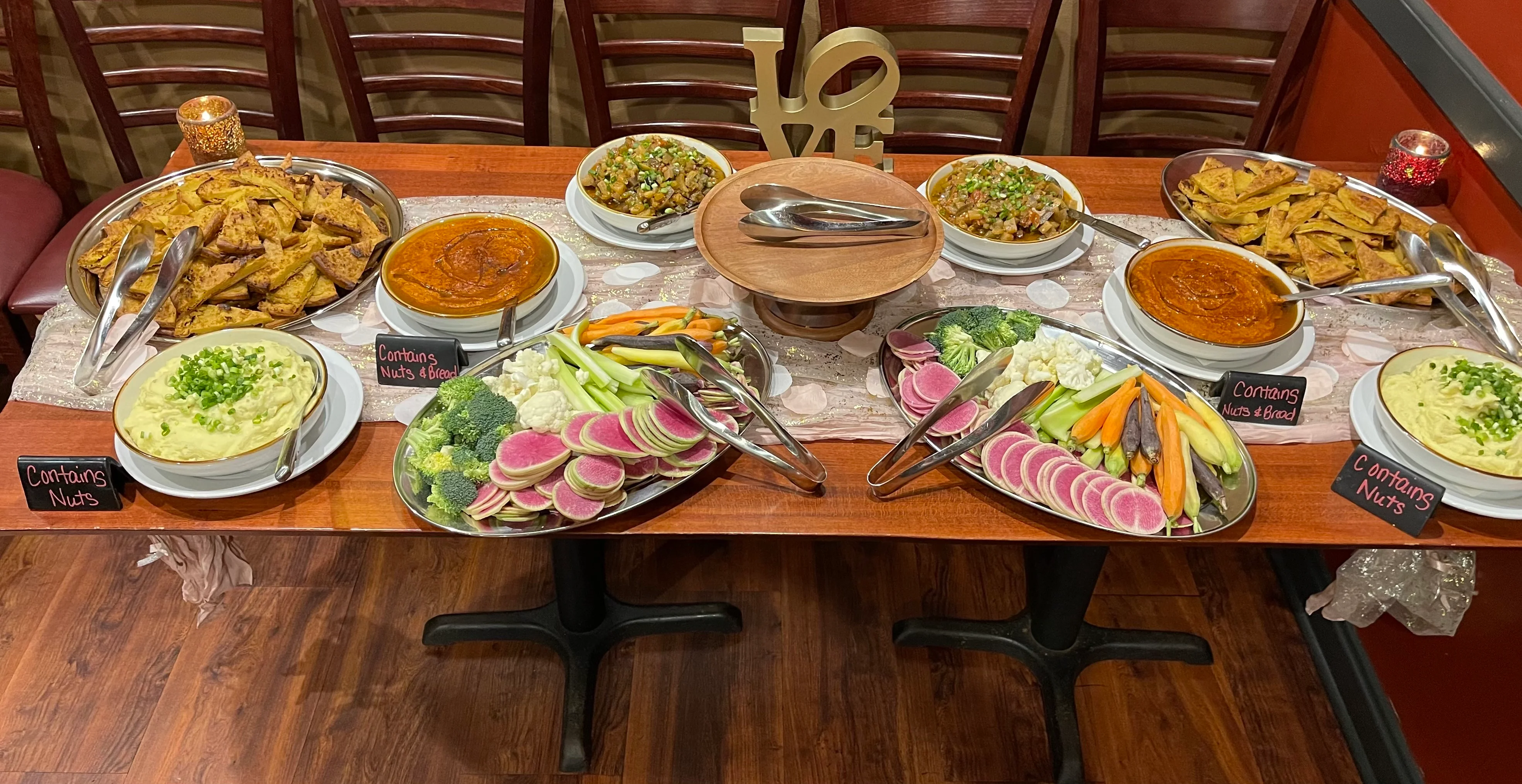 Assorted Indian appetizers and dishes on a banquet table