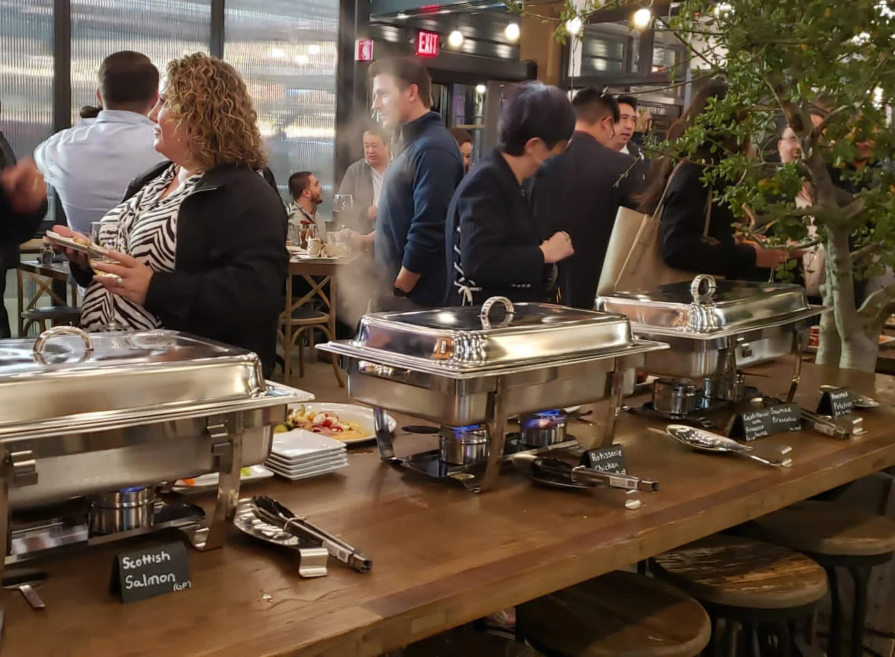 Buffet setup with various dishes in a modern restaurant setting