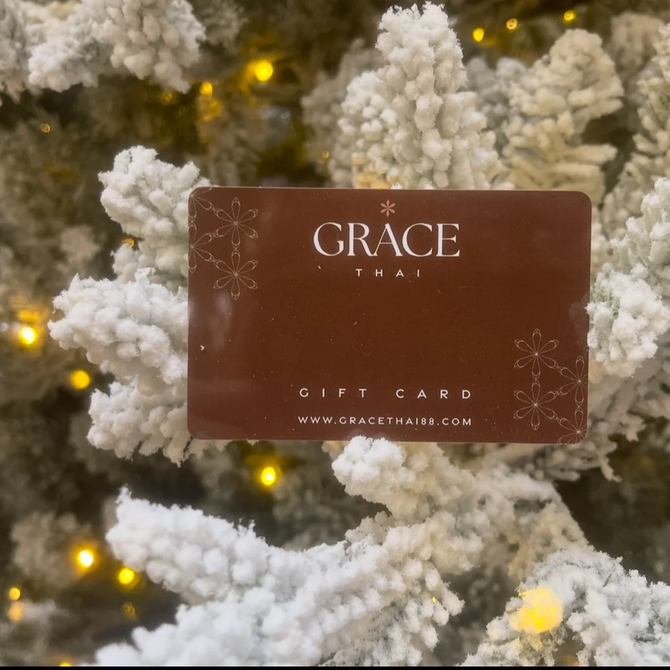 Grace Thai restaurant gift card on a festive tree