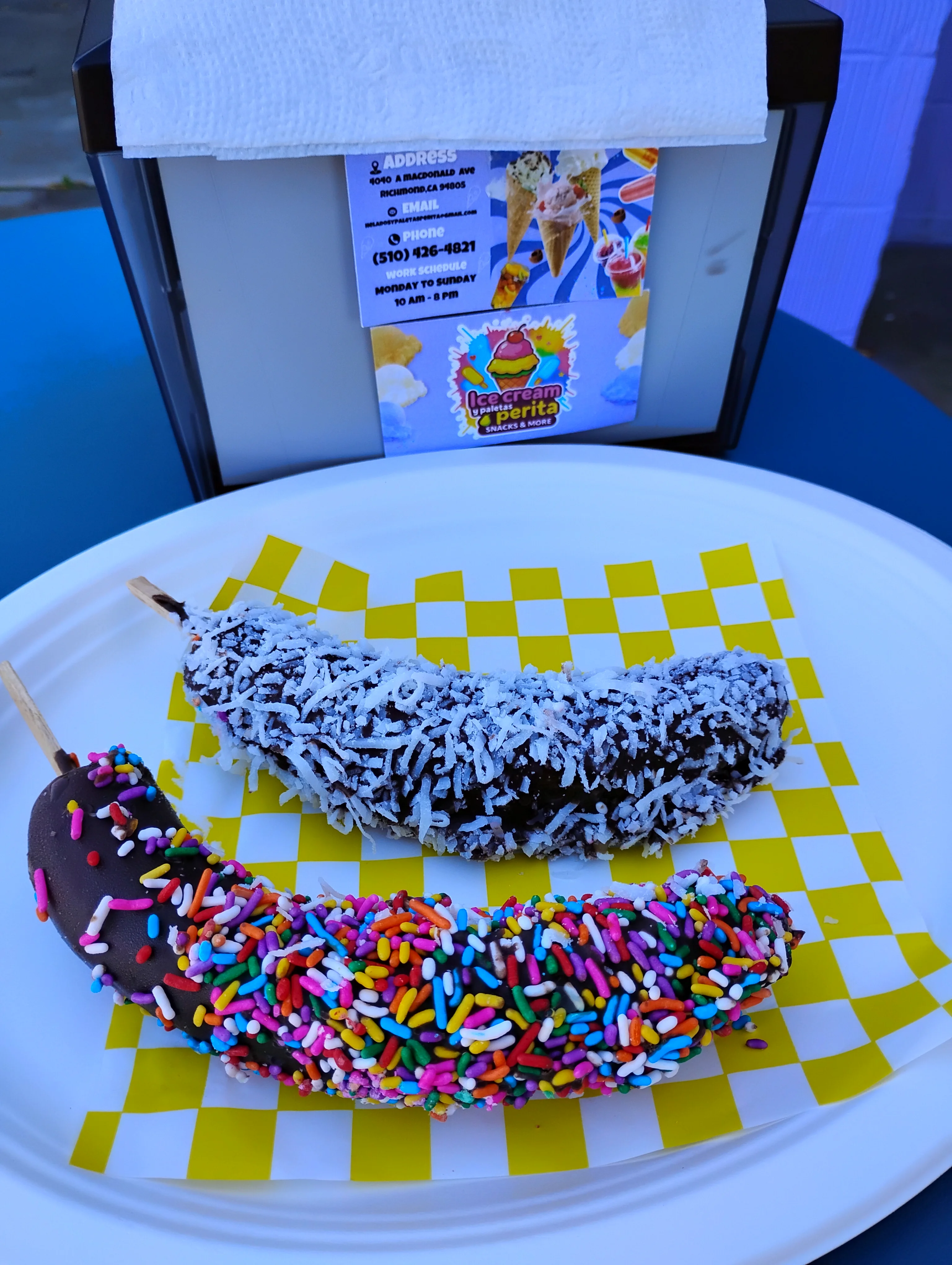 Chocolate-covered frozen bananas with sprinkles