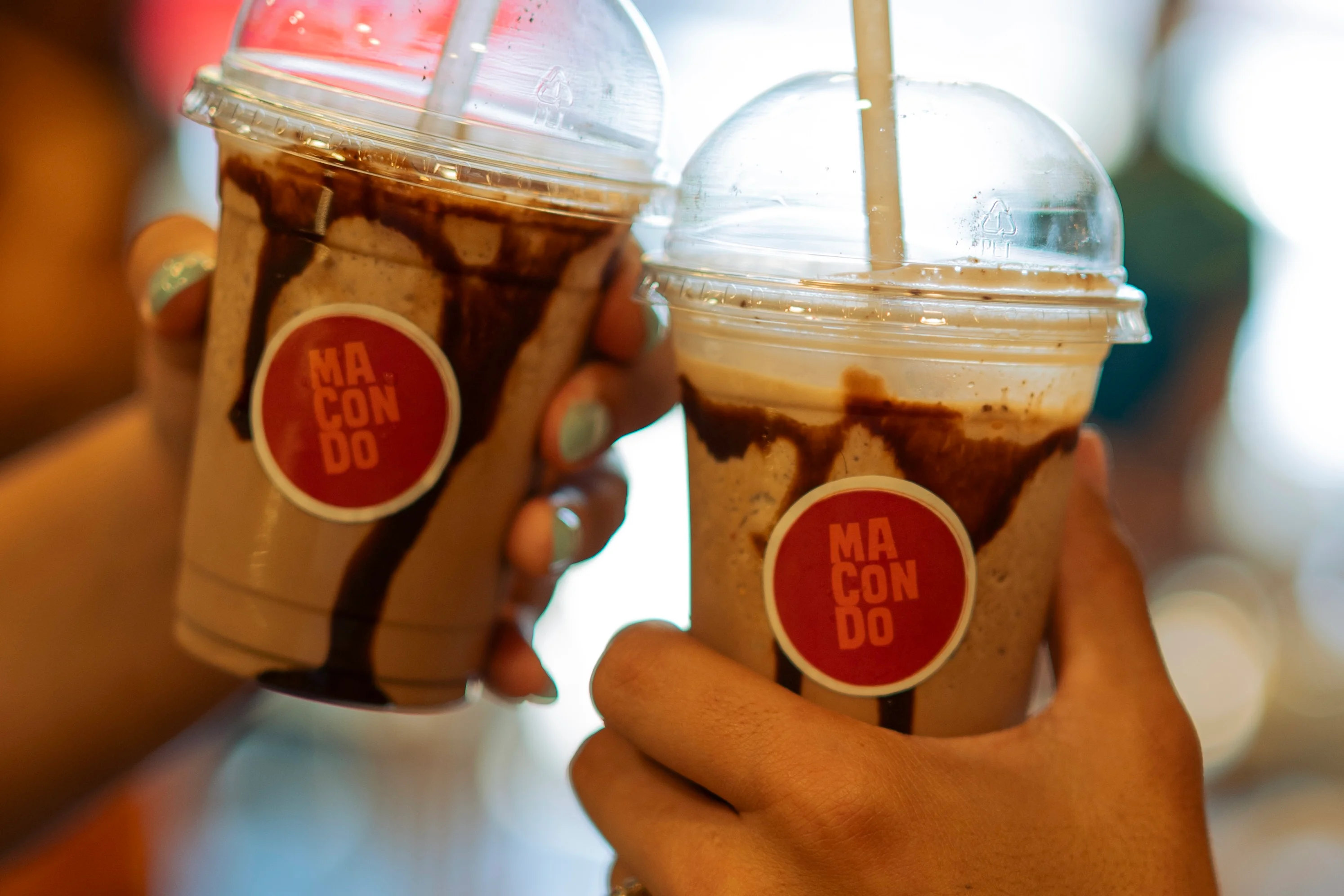 Chilled chocolate and coffee frappes in clear cups