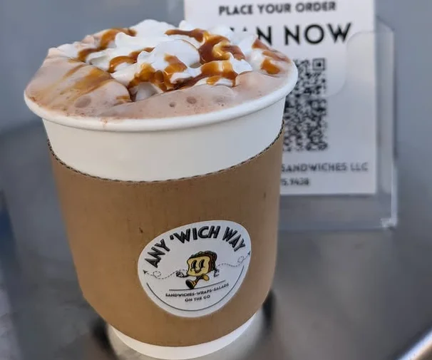 Delicious caramel hot chocolate topped with whipped cream