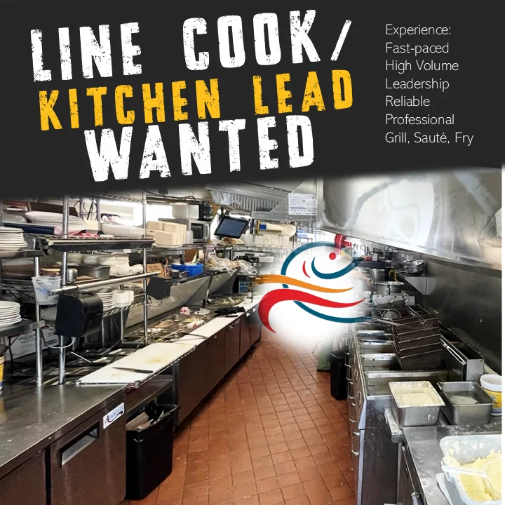 Line cook preparing food in a restaurant kitchen.