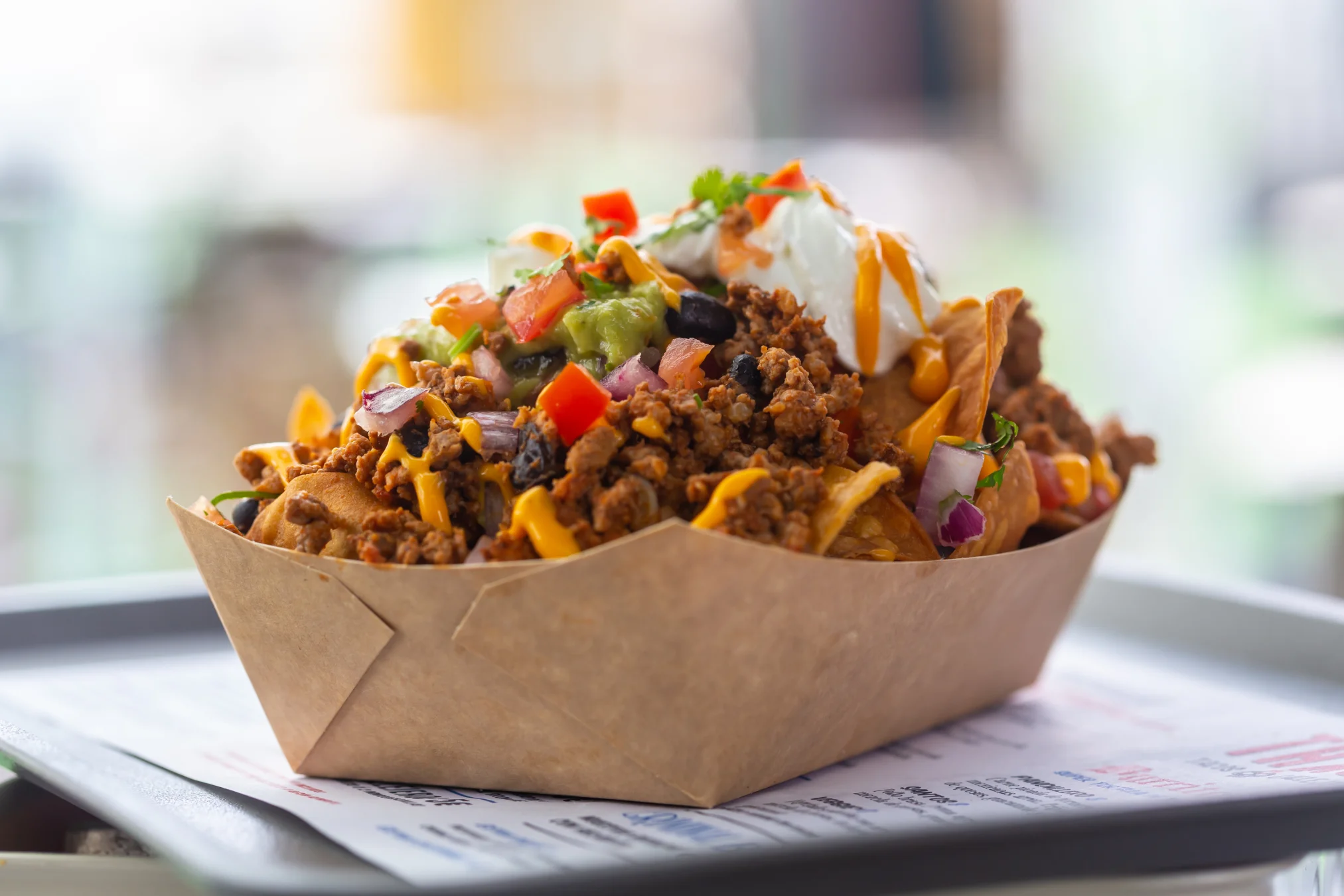 Loaded nachos with beef and toppings