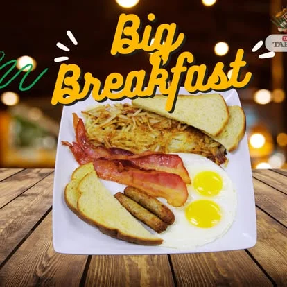Classic American breakfast platter with eggs, bacon, and toast