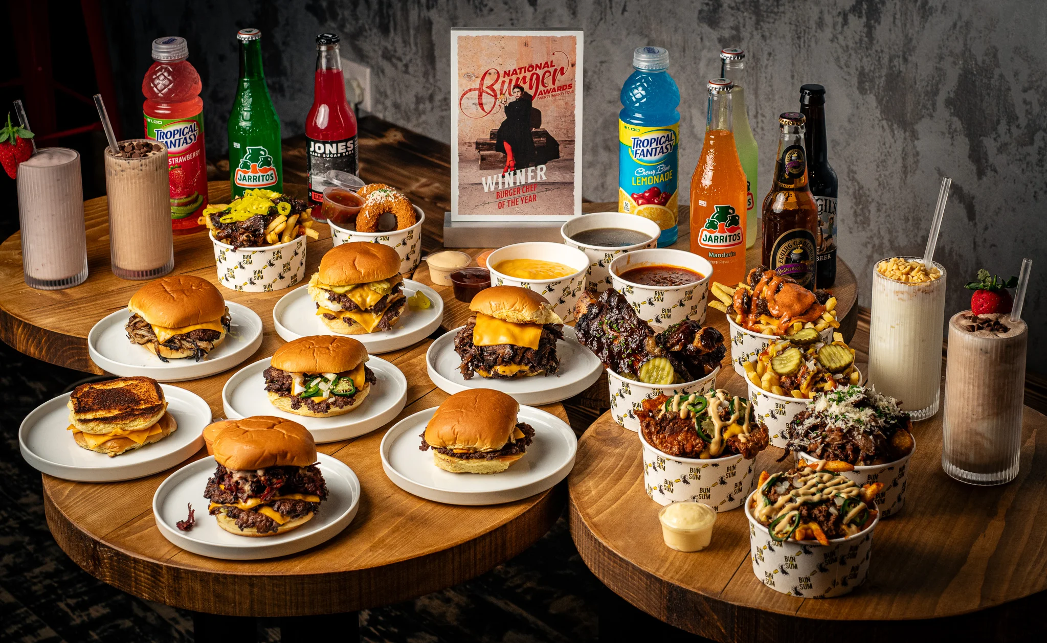 A beautifully arranged table with delicious food and drinks in a restaurant setting.