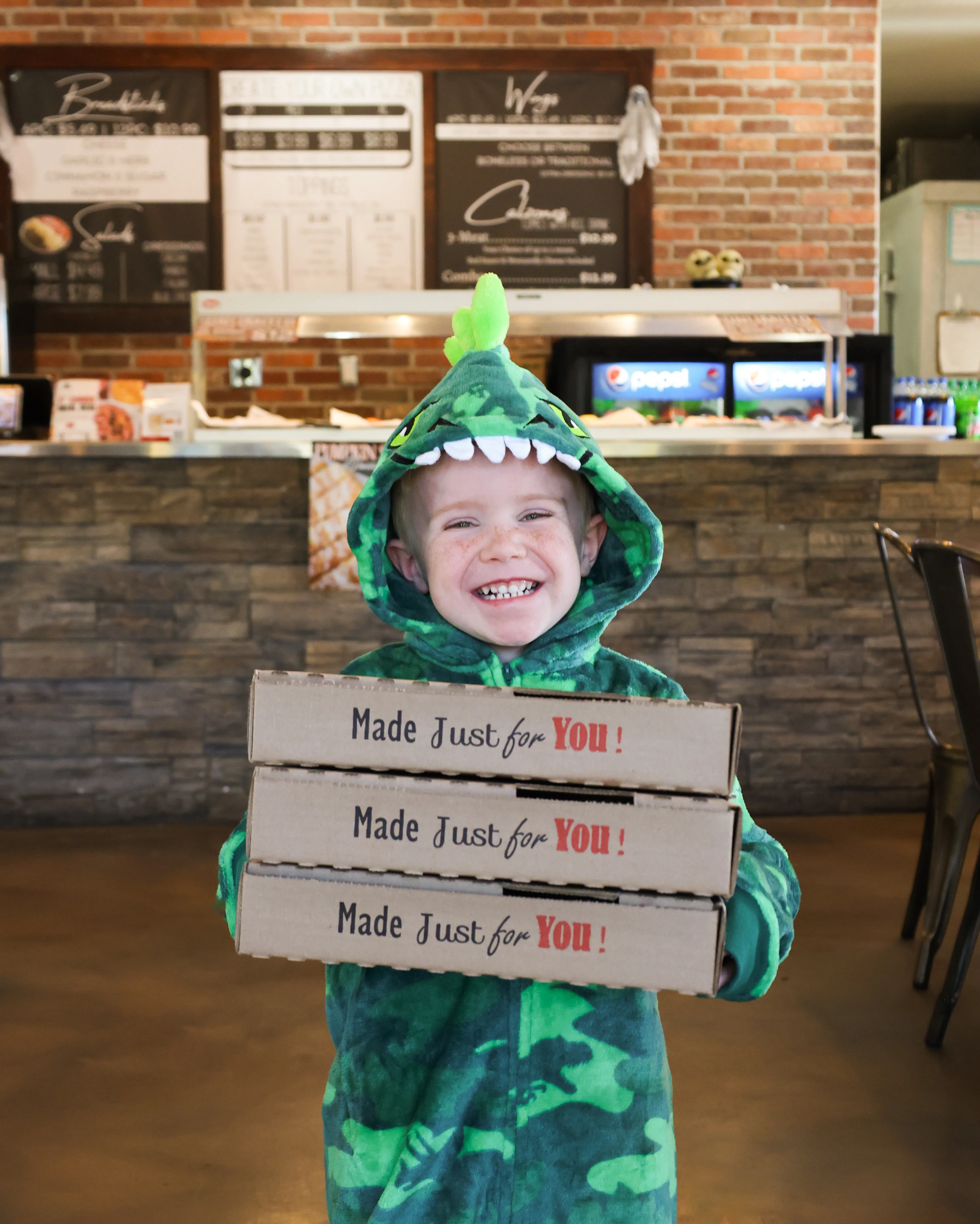 Discover the welcoming charm of a family-owned pizzeria at Village Pizza, where delicious pies and a warm atmosphere create the perfect gathering spot for all ages.