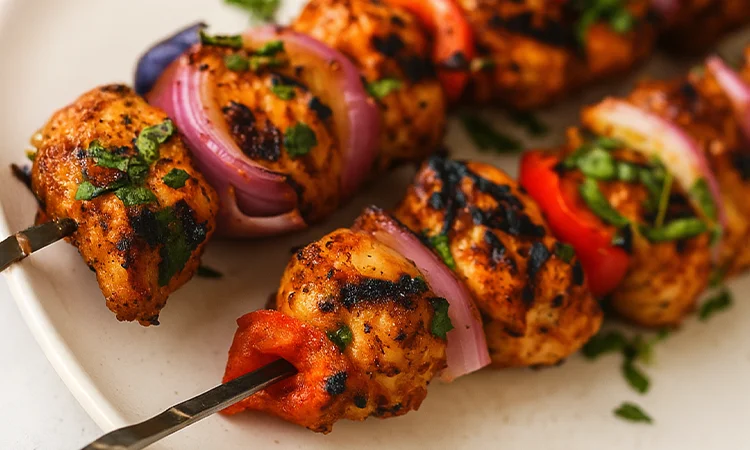 Grilled chicken kebabs with vegetables