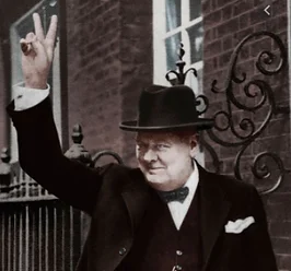 Historical figure giving a peace sign in formal attire