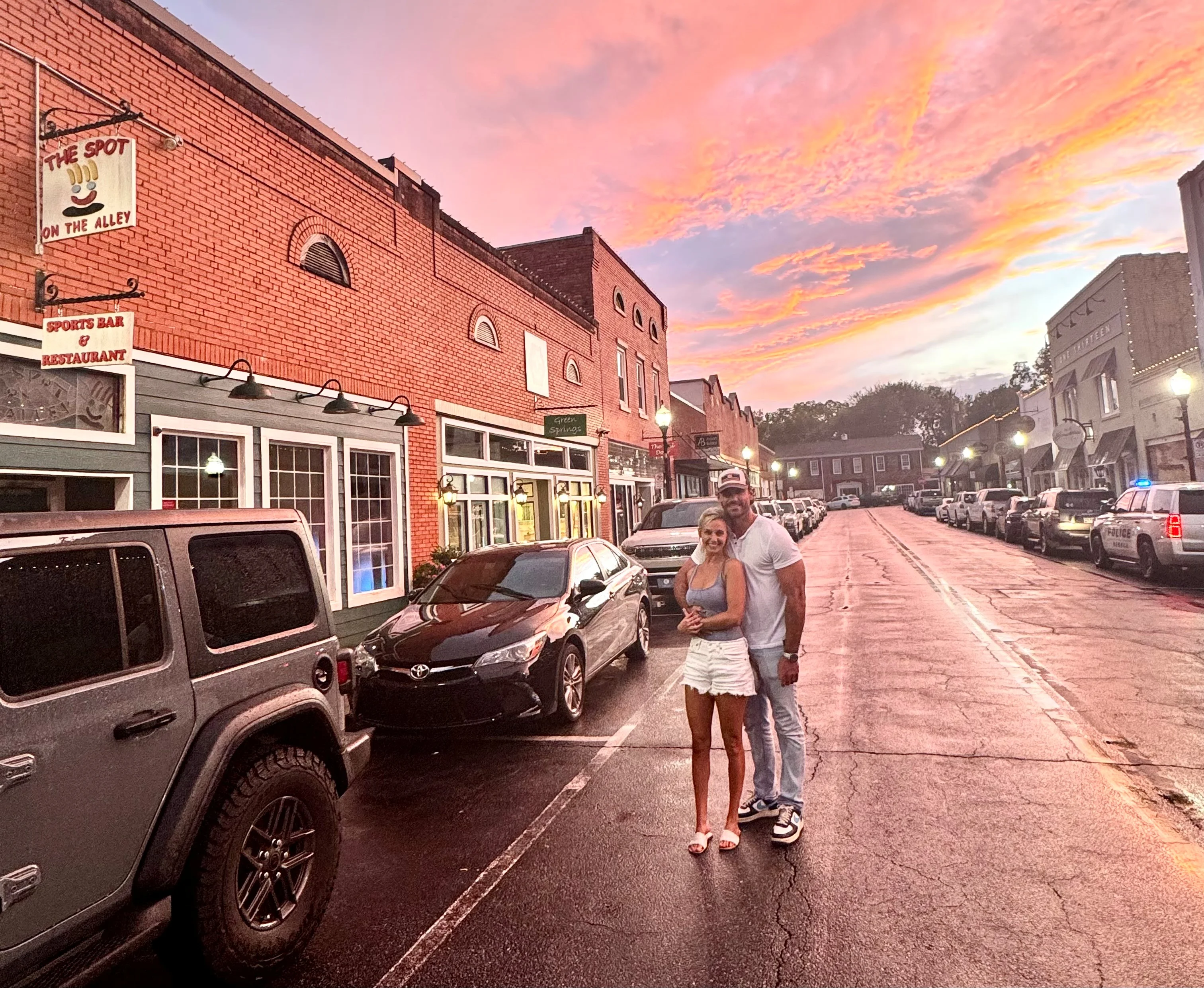 Charming street view at sunset with restaurant signage