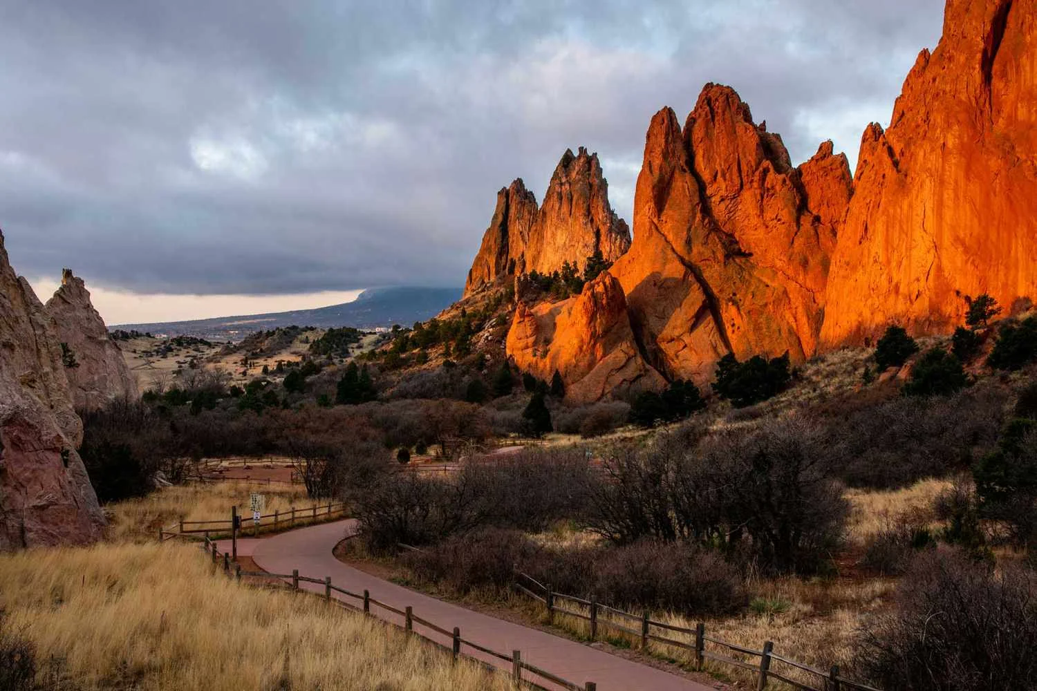 Scenic view of red rock formations at sunset in a natural landscape