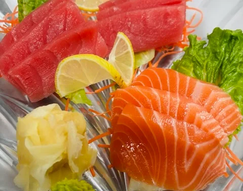 Sashimi platter featuring fresh salmon and tuna
