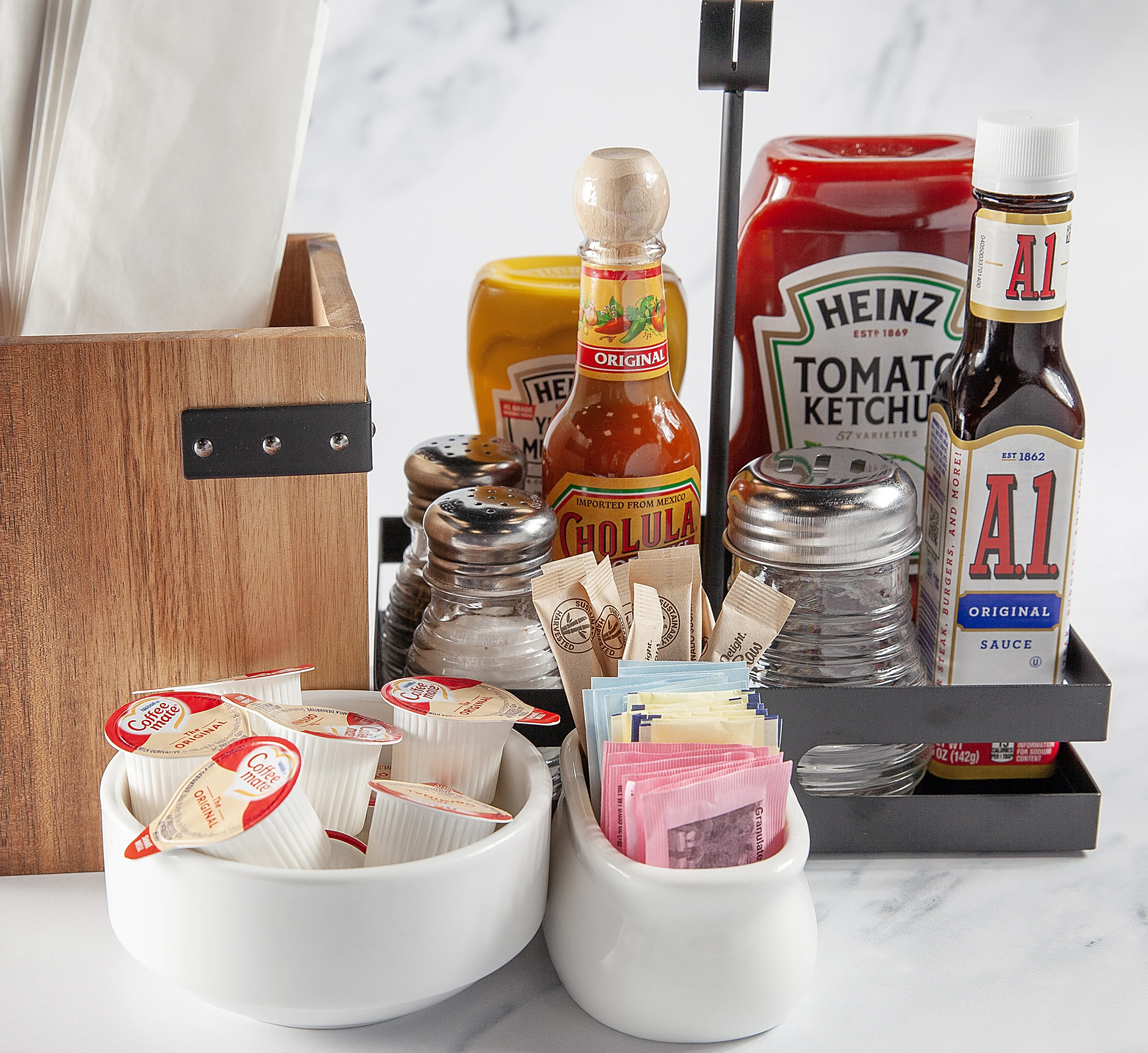 Condiment station with sauces and napkins in a restaurant setting